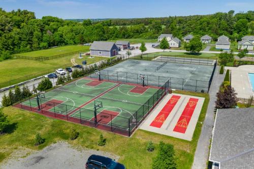 an overhead view of a tennis court with a tennis at The Jackrabbit - 3 Summer Village in Cherry Valley
