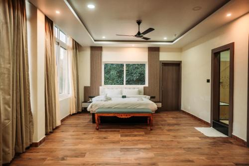 Ένα ή περισσότερα κρεβάτια σε δωμάτιο στο Papum Pare Jungle Resort