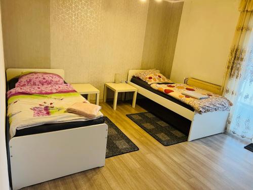 Katil atau katil-katil dalam bilik di Apartment Rimpar