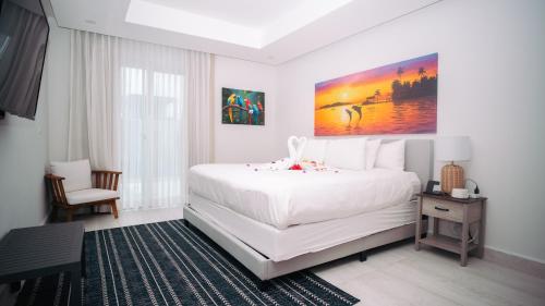 Ein Bett oder Betten in einem Zimmer der Unterkunft Ocean One Roatan