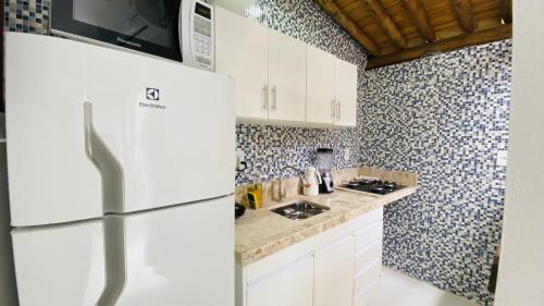 Η κουζίνα ή μικρή κουζίνα στο Aloha Residence I