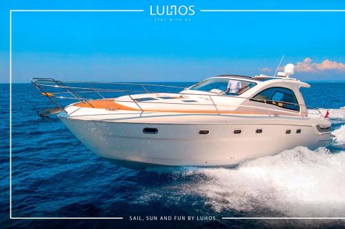 a white boat on the water in the ocean at Stylish Haven Heated Pool Pool Table L28 in Cutler Bay