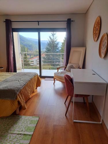 Ένα ή περισσότερα κρεβάτια σε δωμάτιο στο Casa Ramada