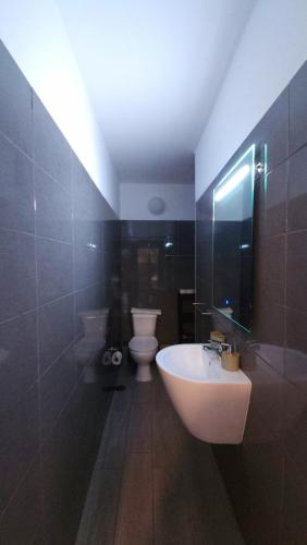 Ένα μπάνιο στο Aura Guesthouse