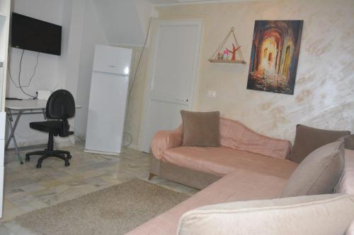 TV a/nebo společenská místnost v ubytování Appartement s1 vue mer à la marsa