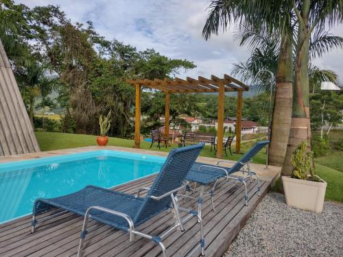 Het zwembad bij of vlak bij Chalé Bem-Estar