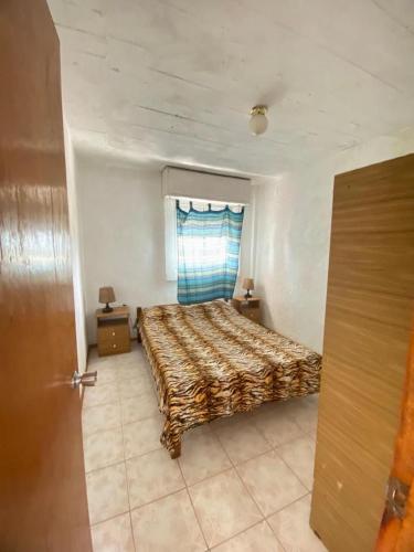 Ένα ή περισσότερα κρεβάτια σε δωμάτιο στο Apartamento en Costa Azul, La Paloma