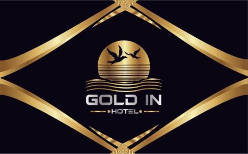 a gold in hollywood logo with a gold medal at Gold in Confort hotel in Barbaros