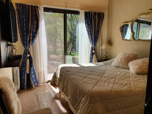 Ένα ή περισσότερα κρεβάτια σε δωμάτιο στο Casa Guifu RUNA YAKU