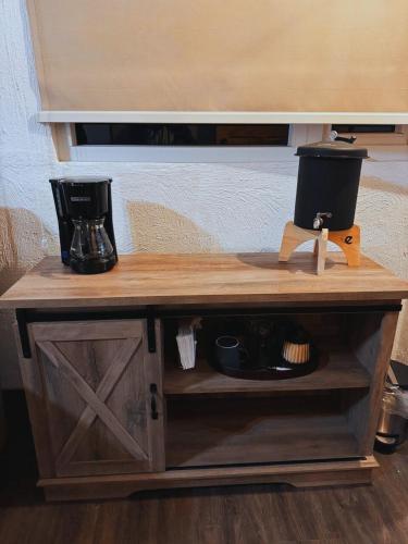Příslušenství pro přípravu čaje a kávy v ubytování Cabañas 50