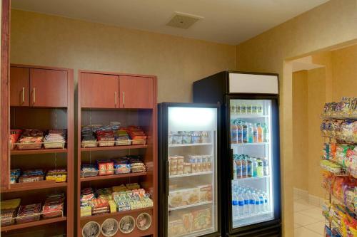 a kitchen with two refrigerators in a room at Residence Inn by Marriott Princeton at Carnegie Center in Princeton