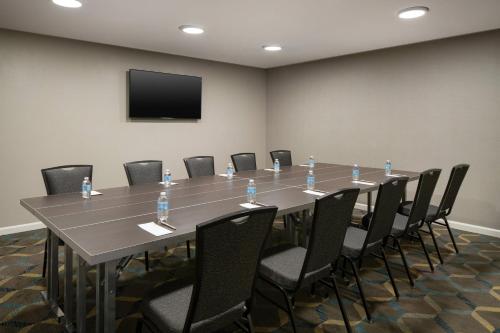 a large conference room with a long table and chairs at Residence Inn Anaheim Placentia/Fullerton in Placentia