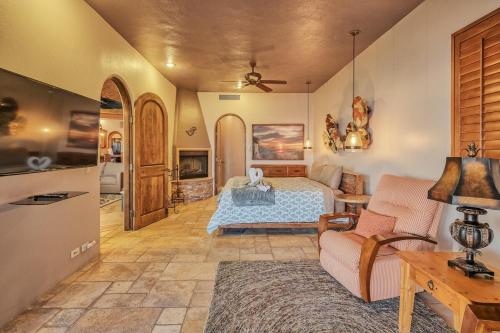 a bedroom with a bed and a living room at Villa Catalina at Bella Sirena - Private Jacuzzi - On the water in Puerto Peñasco