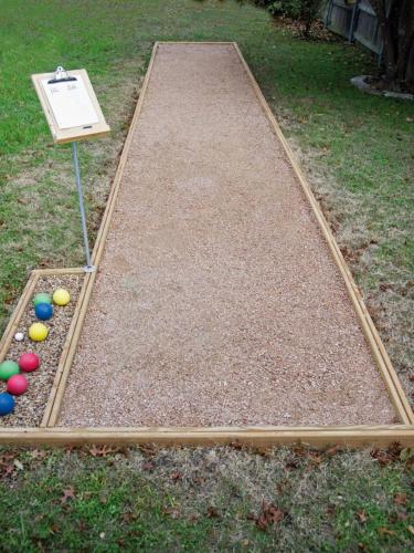 a miniature golf course with balls on the grass at Dreamy Lake House - Fireplace, Firepit & Pet Friendly in Pocono Lake