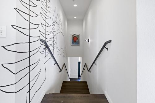 a stairway with a graph on the wall at Gardenia at Evergreen in Redding