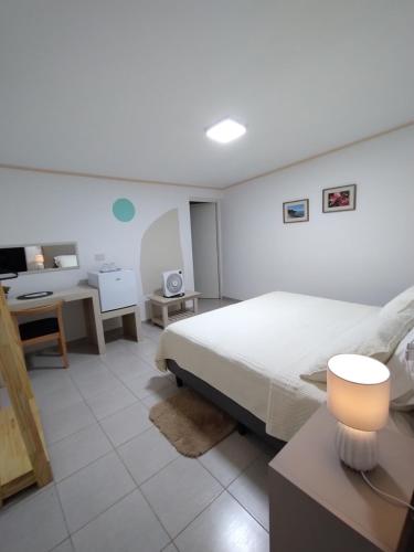 En eller flere senge i et værelse på My Place Boutique Hotel