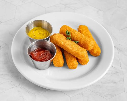 a plate of food withsticks and k dipping sauce at Holiday Inn Rock Hill by IHG in Rock Hill