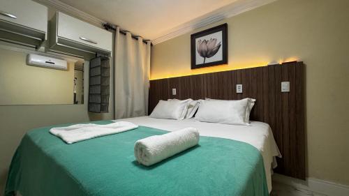 Rúm í herbergi á Solar de Pipa Vip Confort - Spa Hidro Flat