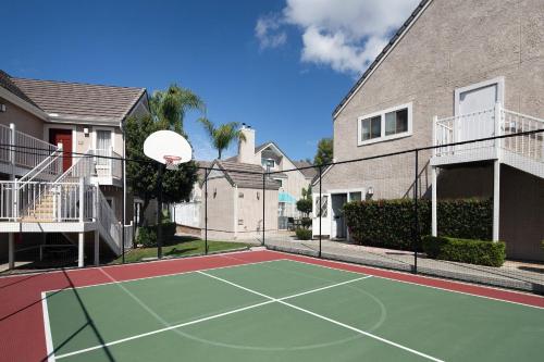 a tennis court in front of a house at Residence Inn Irvine Spectrum in Irvine
