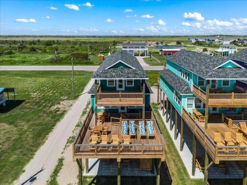 an aerial view of a house with decks at Mimosa Beach - Luxury Beachfront 5BR, Gorgeous views from multiple Decks in Gilchrist