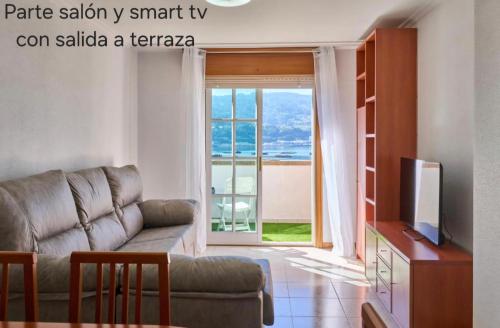 TV a/nebo společenská místnost v ubytování Atico A Tella
