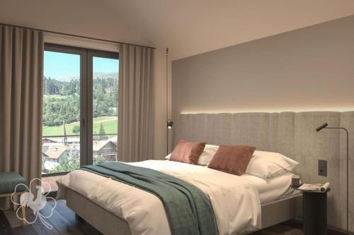 a bedroom with a large bed and a large window at modernes Chalet in Hahnenklee in Hahnenklee-Bockswiese