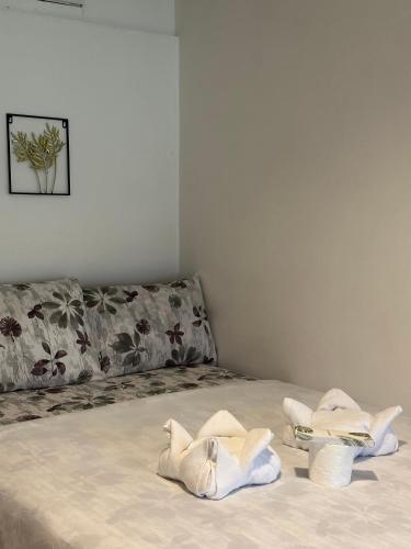 Postel nebo postele na pokoji v ubytování Trisha Guesthouse
