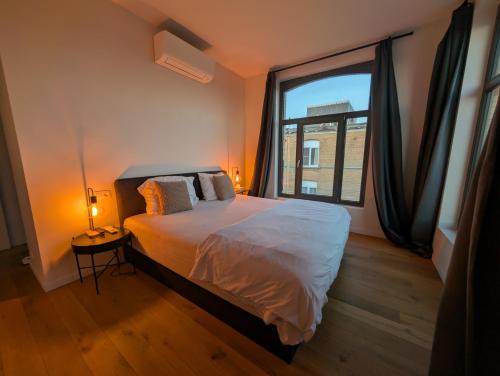 Voodi või voodid majutusasutuse Luxury Duplex Suite 2-Story toas