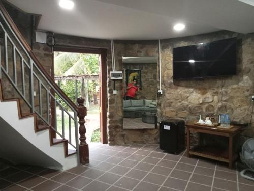 Μια τηλεόραση ή/και κέντρο ψυχαγωγίας στο Ganesha Kampot Resort