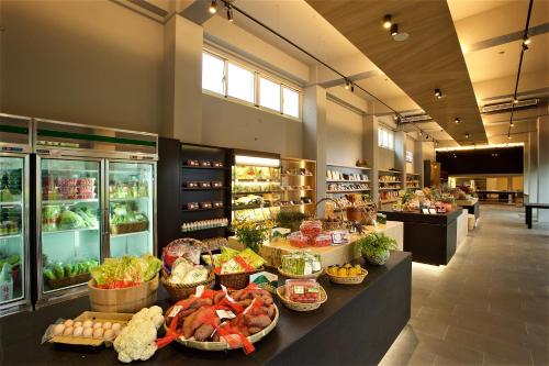 a store filled with lots of fruits and vegetables at Gaeavilla Resort in Jian