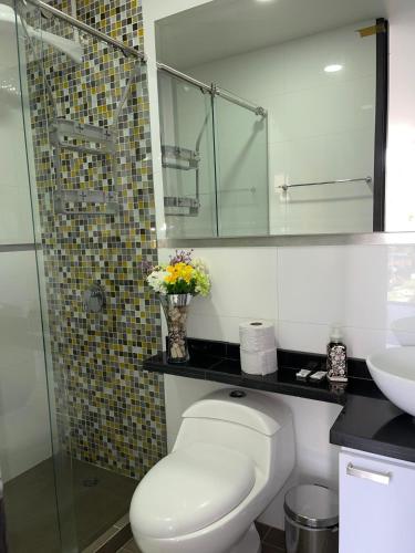O baie la Confortable apartamento