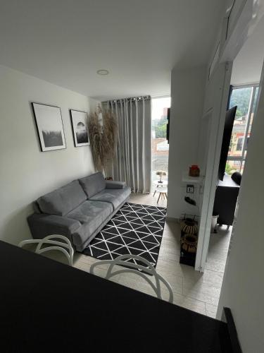 Zona d'estar a Confortable apartamento