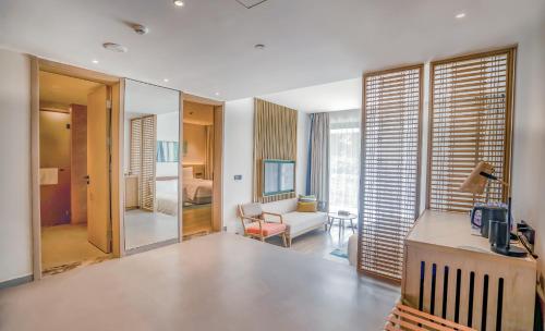 Postel nebo postele na pokoji v ubytování Holiday Inn Hainan Xiangshui Bay by IHG