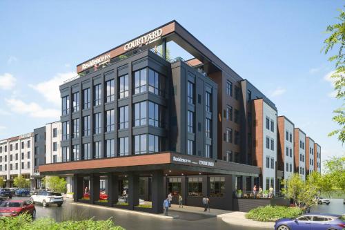 a rendering of a building with cars parked in a parking lot at Courtyard by Marriott Milwaukee Brookfield at Poplar Creek in Brookfield