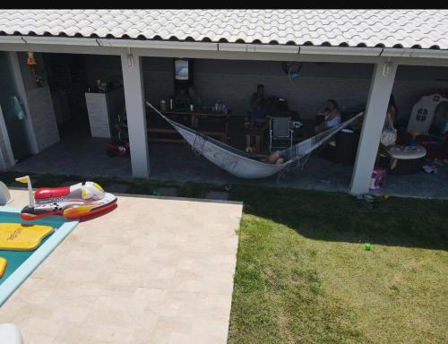 Φωτογραφία από το άλμπουμ του Casa com Piscina,Area gourmet,3 quartos,espaço Kids σε Saquarema