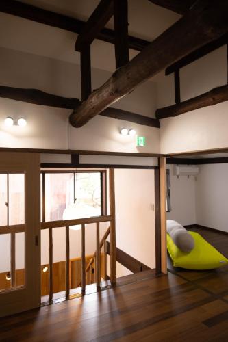 Postel nebo postele na pokoji v ubytování MEMORY GATEWAY HOTEL 101 Katayamatei