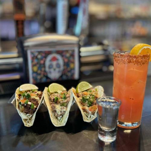 a group of tacos and a drink on a table at Anavada Inn & Suites - Prince George in Prince George