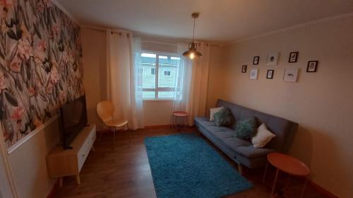 Posezení v ubytování 10 min del centro, 500 mt de la playa Pelluco, visita, disfruta y descansa