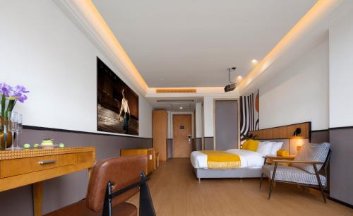 TV a/nebo společenská místnost v ubytování Anyuechengxiang Hotel