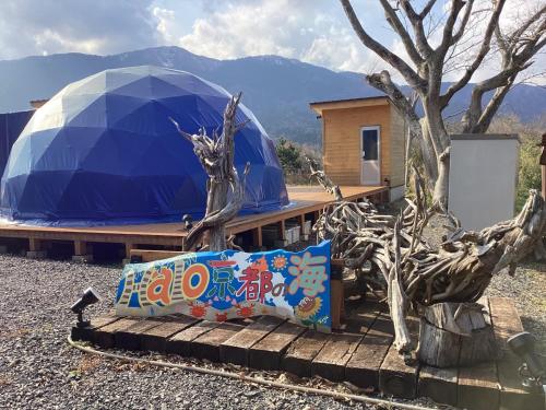 a blue dome tent with a pillow and a tree at Halo KYOTO no UMI | Hello Kyoto no UMI - Vacation STAY 40860v in Yura
