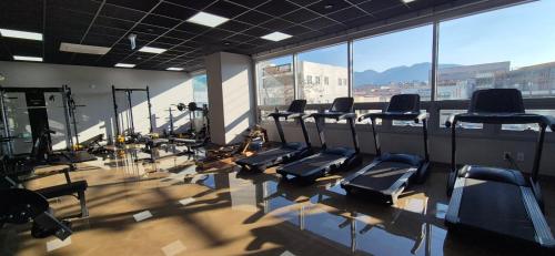 a gym with rows of chairs and a large window at Elmomento Sasang in Busan
