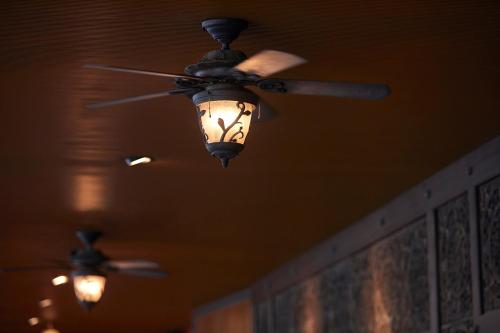 two ceiling fans are hanging from the ceiling at Kakegawa Grand Hotel in Kakegawa