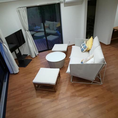 Un lugar para sentarse en Enraku Villa