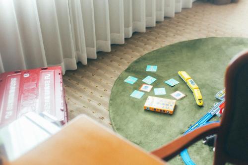 a table with a toy car on top of it at Kakegawa Grand Hotel in Kakegawa