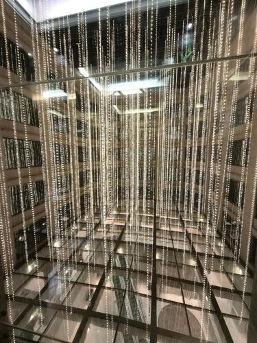 a large glass window with strings of lights at Wyndham Grand Xi'an South in Xi'an