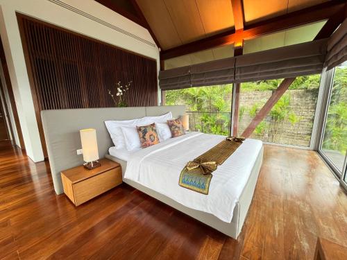 Katil atau katil-katil dalam bilik di Laemsingh Villa 1 - Luxury Villa 5 Bedrooms