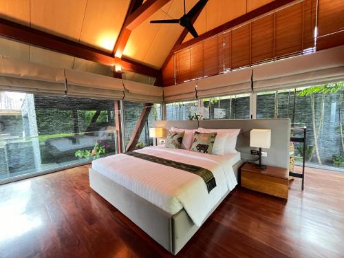 Katil atau katil-katil dalam bilik di Laemsingh Villa 1 - Luxury Villa 5 Bedrooms