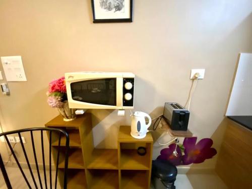 Bliss Holiday Homeにあるテレビまたはエンターテインメントセンター