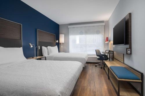 Postel nebo postele na pokoji v ubytování Tru By Hilton Phoenix Midtown