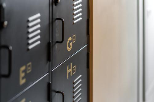a close up of a row of lockers at Getcha Hostel in Taichung